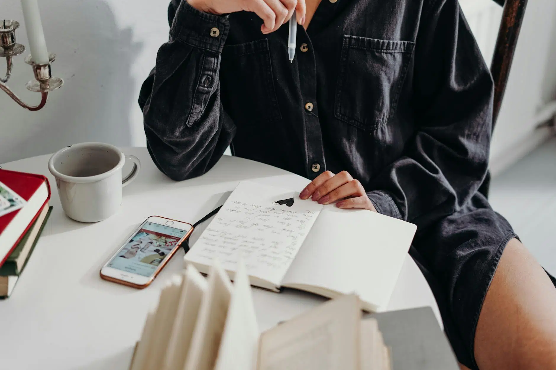 midlife imposter syndrome in women sitting on wooden chair