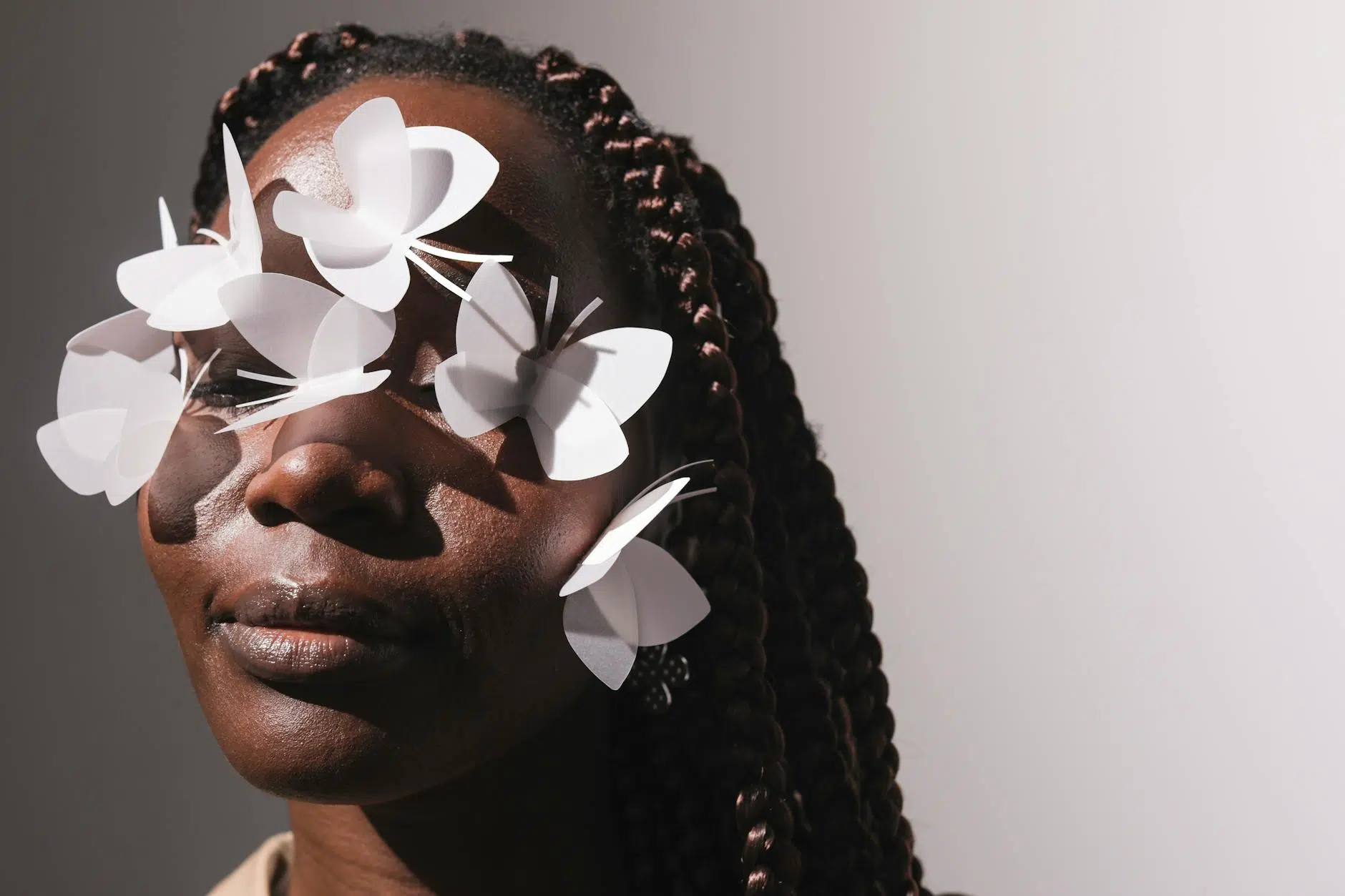 fear of visibility a woman with butterflies on the face