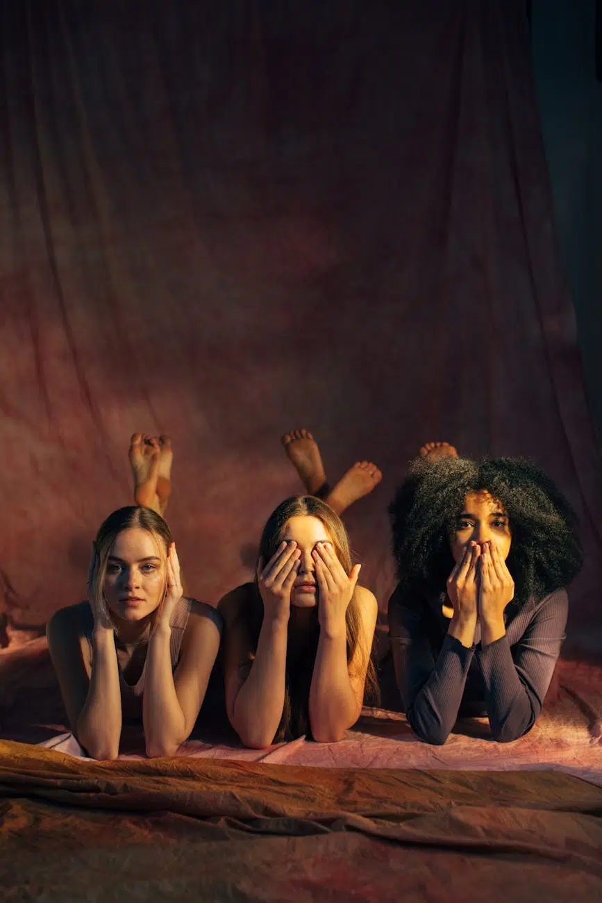 performative femininity women lying on the floor together